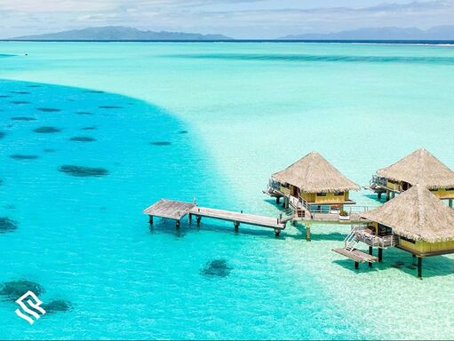 Beautiful over the water bungalows in Tahiti. Photo by Silversea